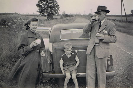 John, Mum and Grandad having a break during a road trip